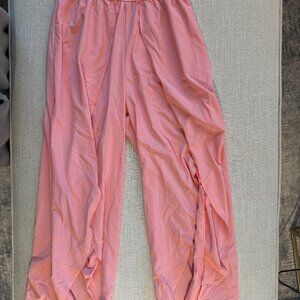 Halara Breezeful Flowy Pants in color Murex Shell.